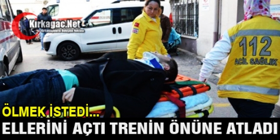 ELLERİNİ AÇTI TRENİN ÖNÜNE ATLADI