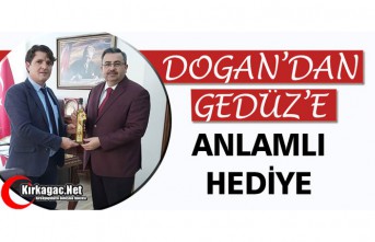 DOĞAN’DAN GEDÜZ’E ANLAMLI HEDİYE