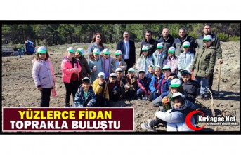YÜZLERCE FİDAN TOPRAKLA BULUŞTU