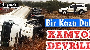 YOLDAN ÇIKAN KAMYON ŞARAMPOLE DEVRİLDİ